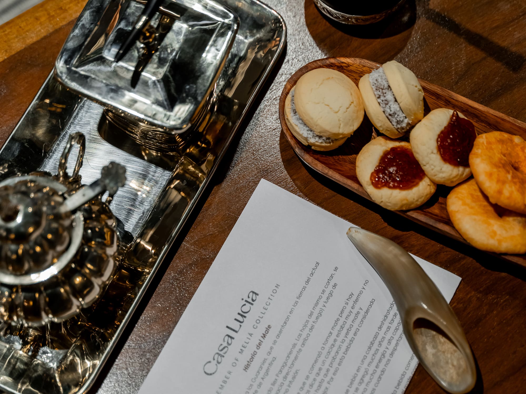 a tray of cookies and a paper on a table