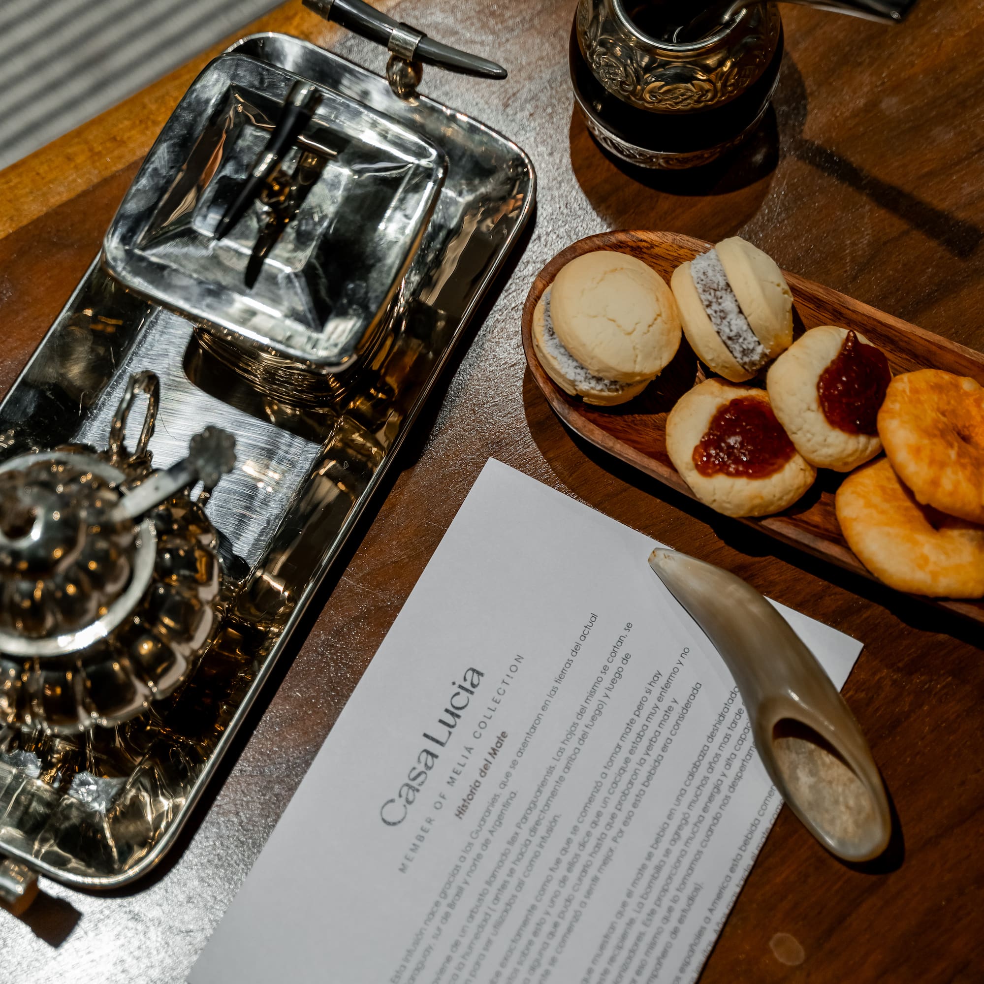 a tray of cookies and a paper on a table