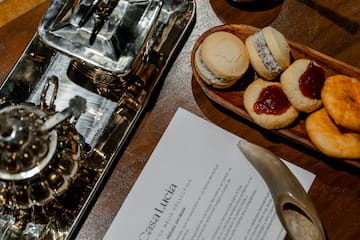 a tray of cookies and a paper on a table