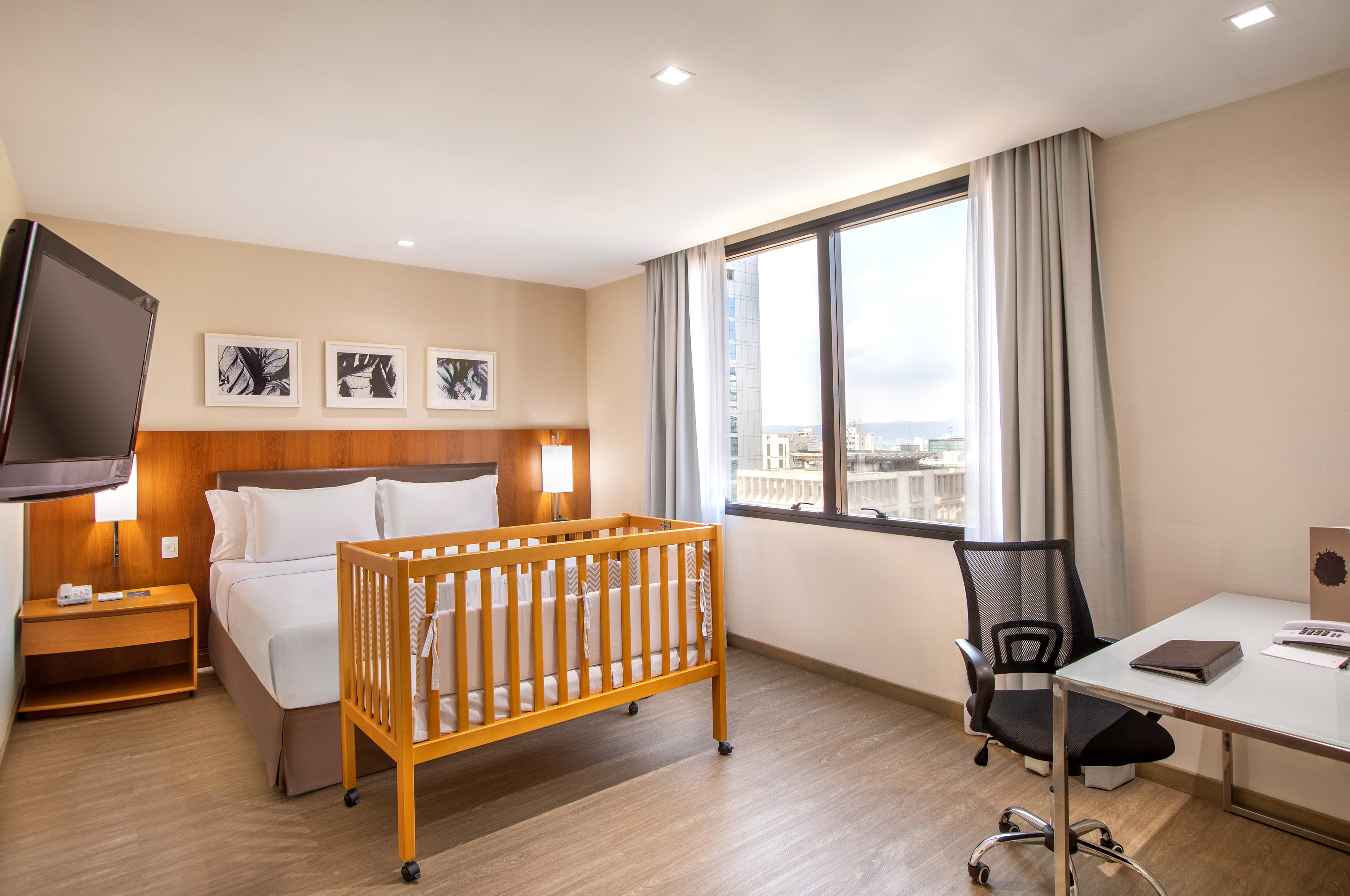 a room with a bed and a desk