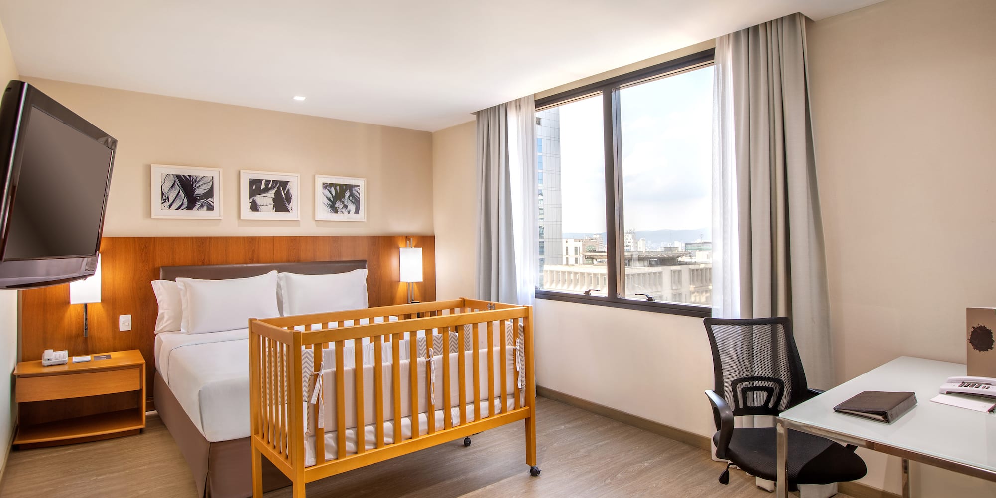 a room with a bed and a desk