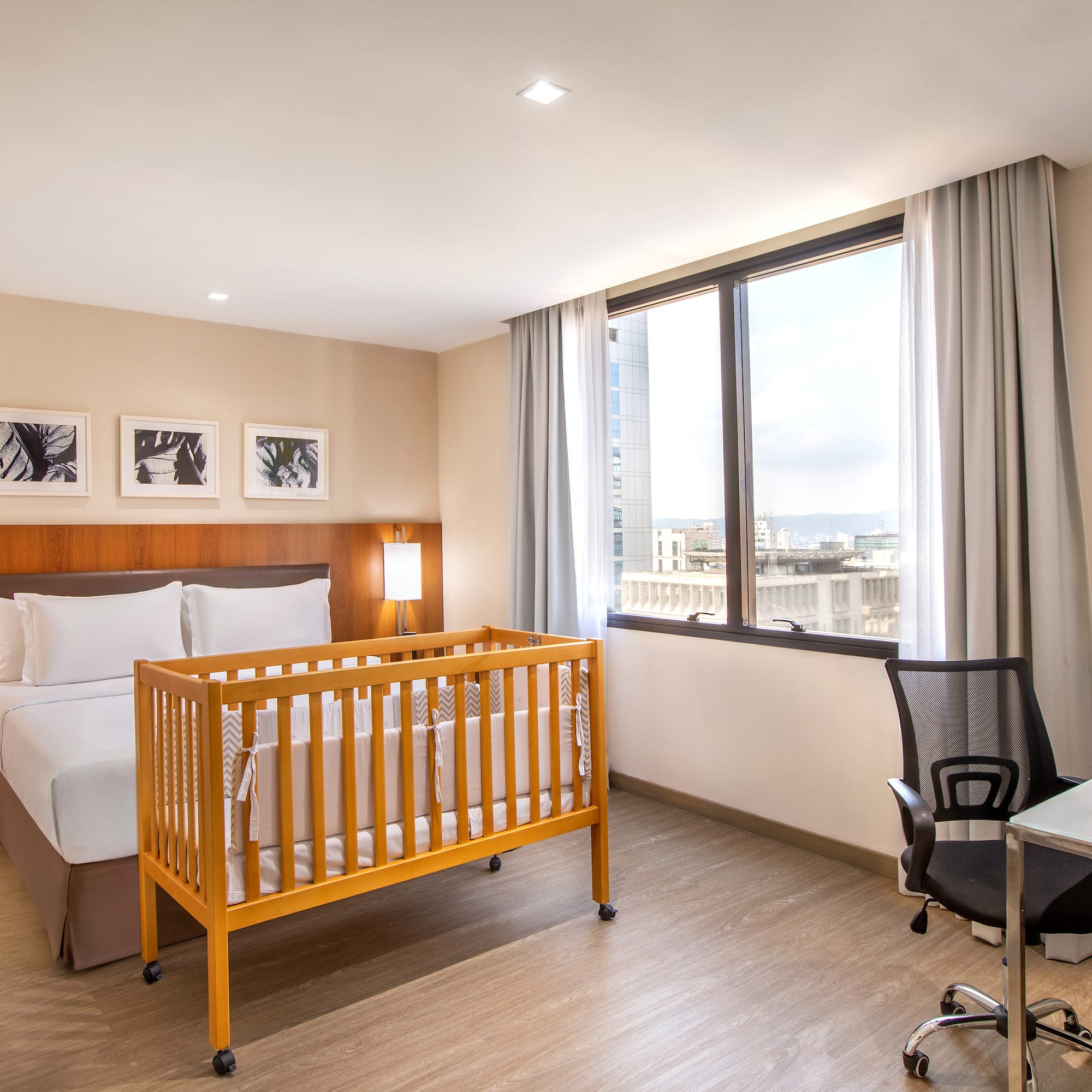 a room with a bed and a desk