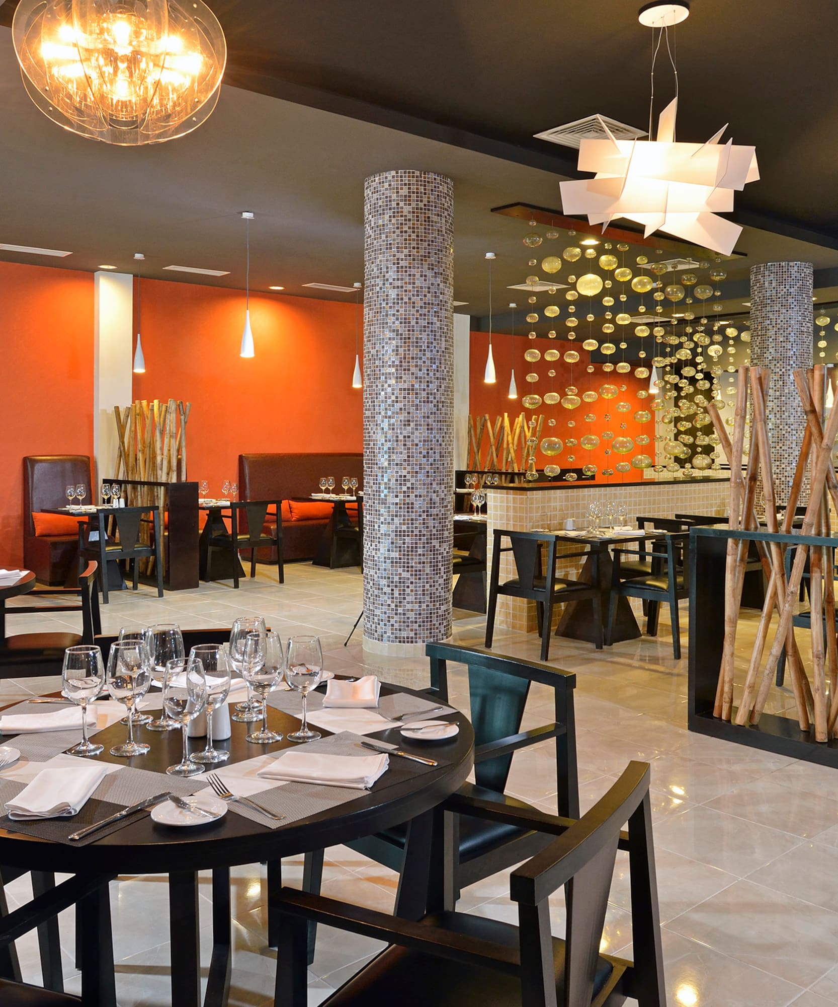 a restaurant with tables and chairs