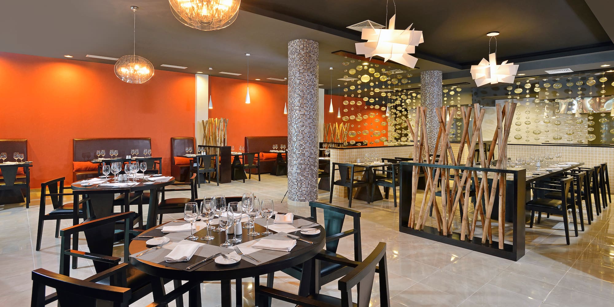 a restaurant with tables and chairs