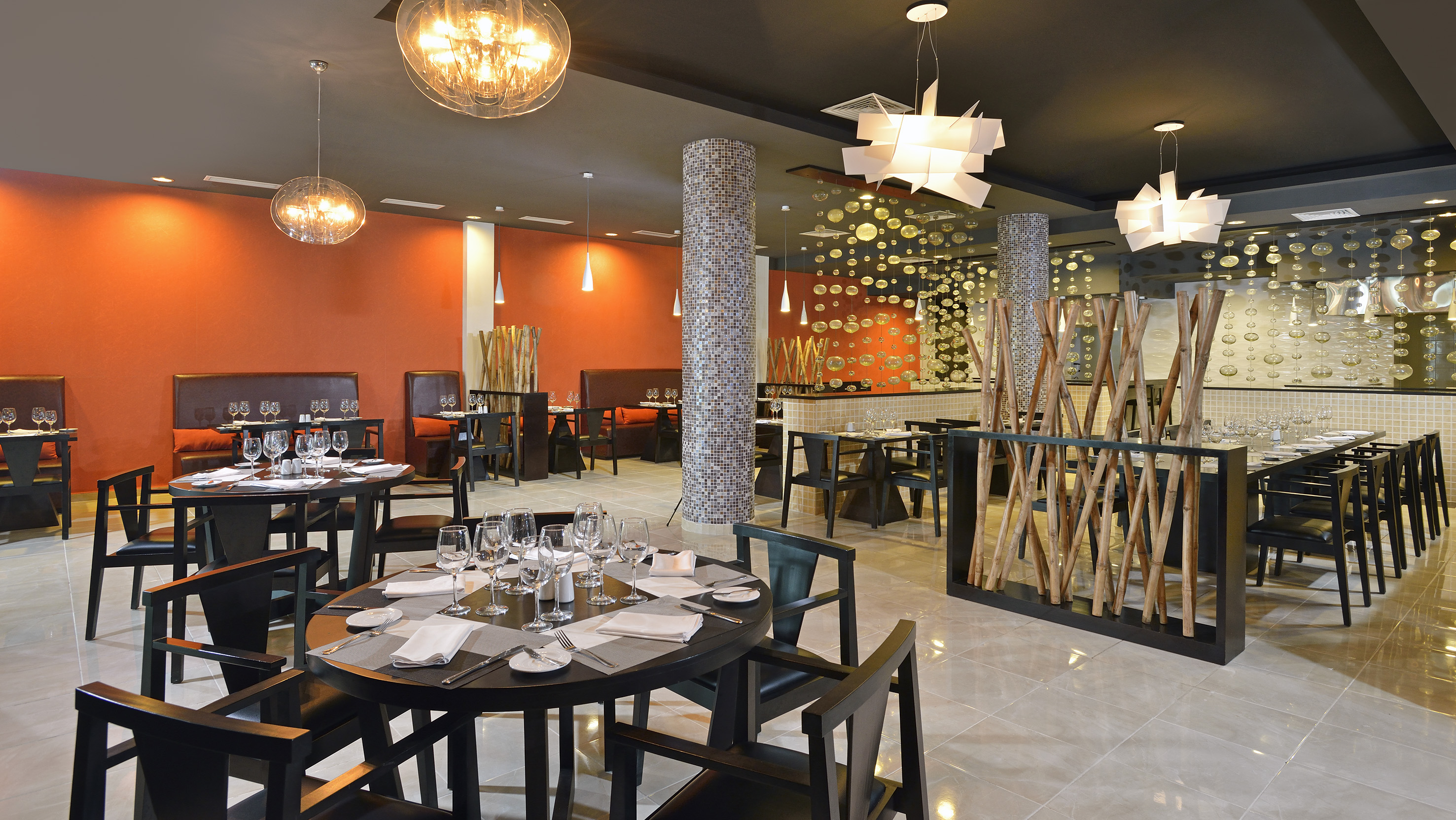 a restaurant with tables and chairs