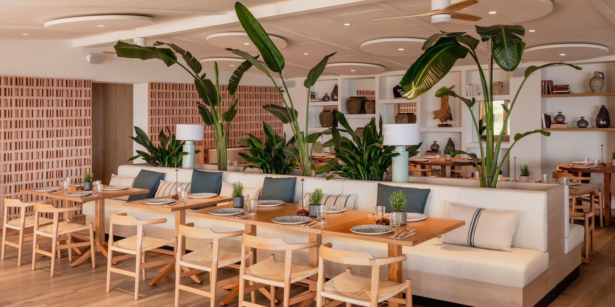 a room with tables and chairs