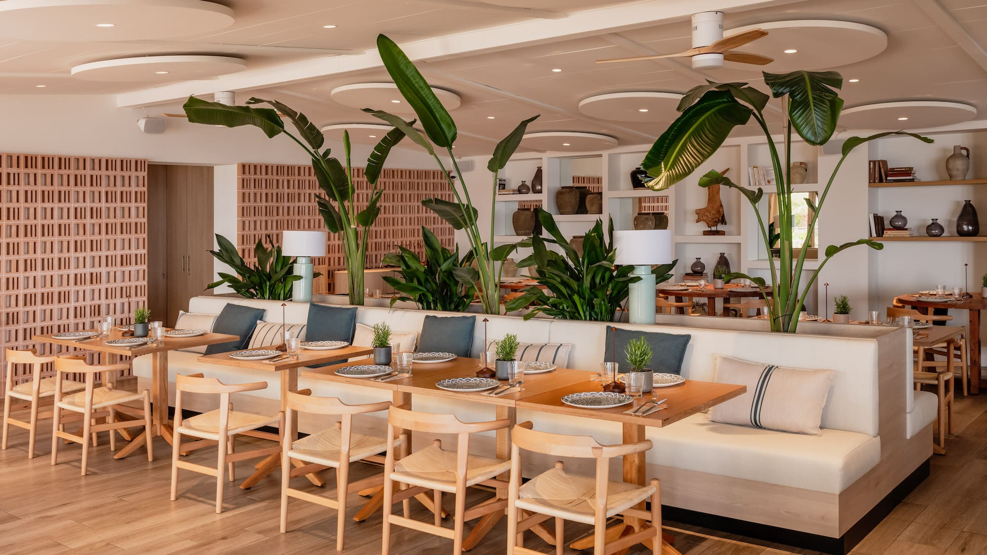 a room with tables and chairs