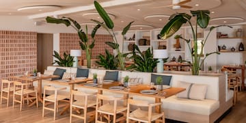 a room with tables and chairs