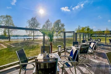 a table and chairs on a deck