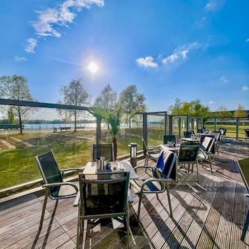 a table and chairs on a deck