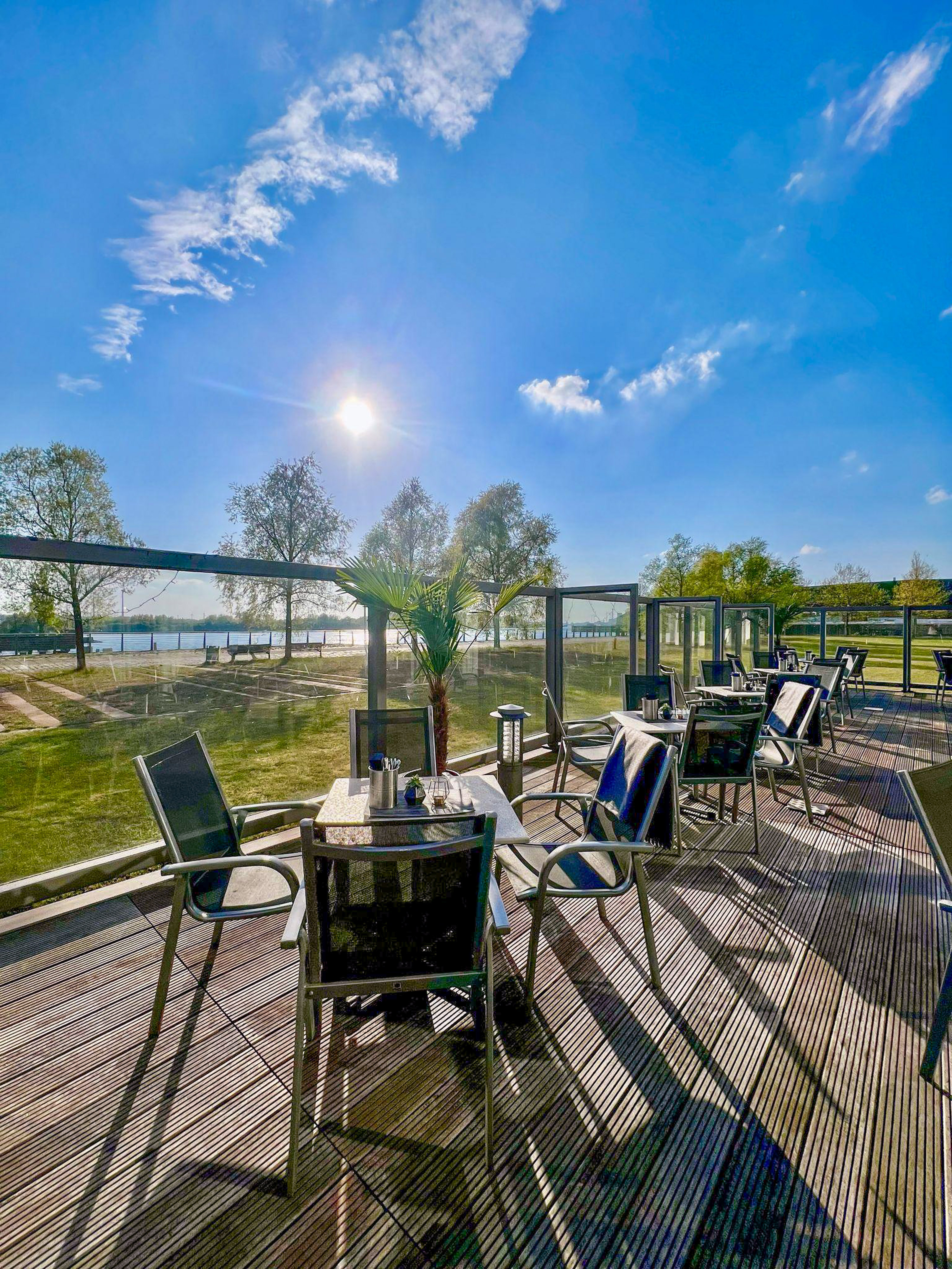 a table and chairs on a deck