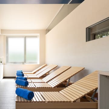 a row of lounge chairs in a room