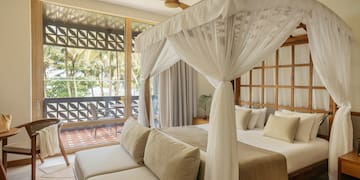 a bed with a canopy over it