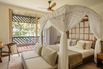 a bed with a canopy over it