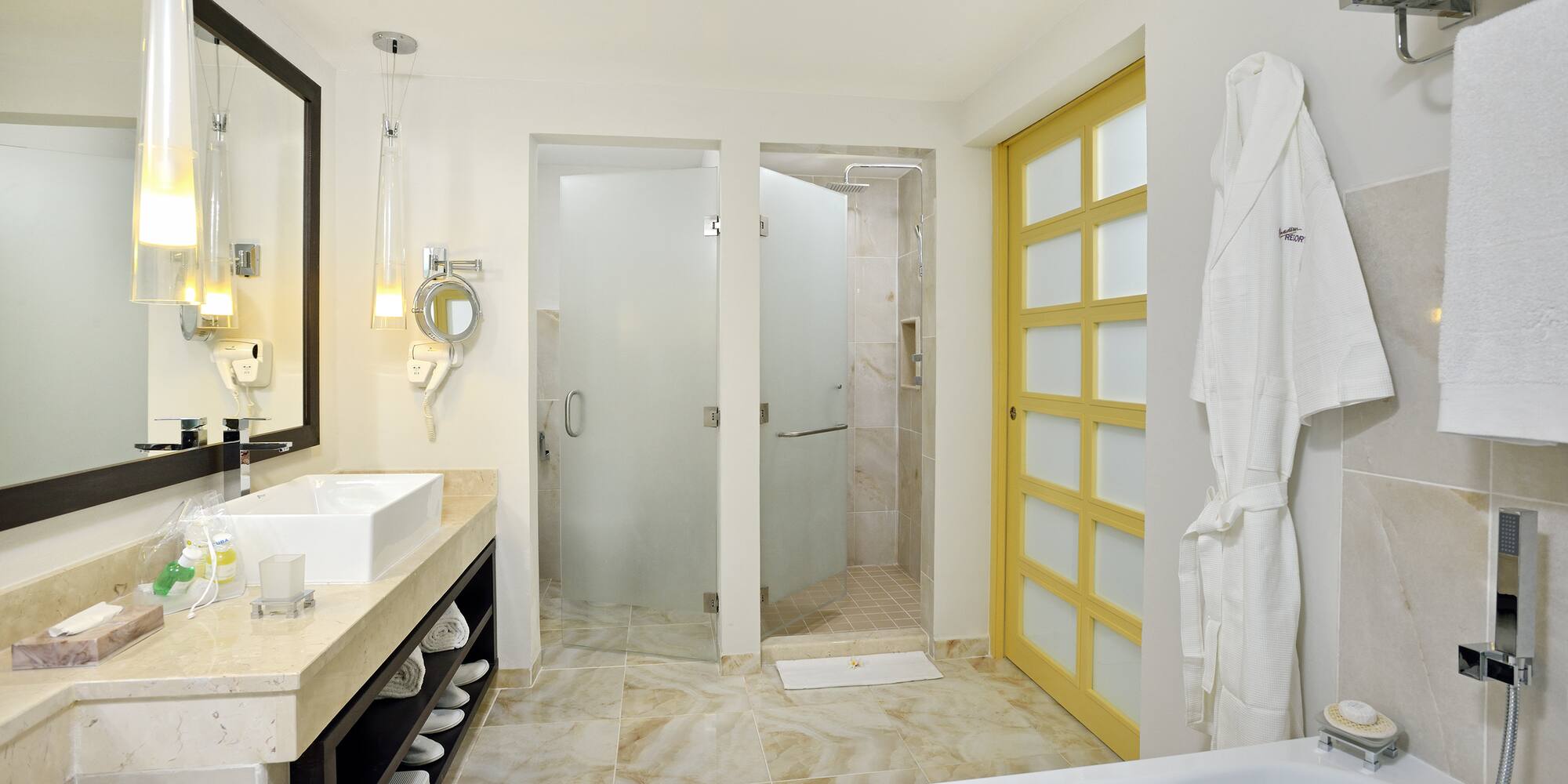a bathroom with a bathtub and shower