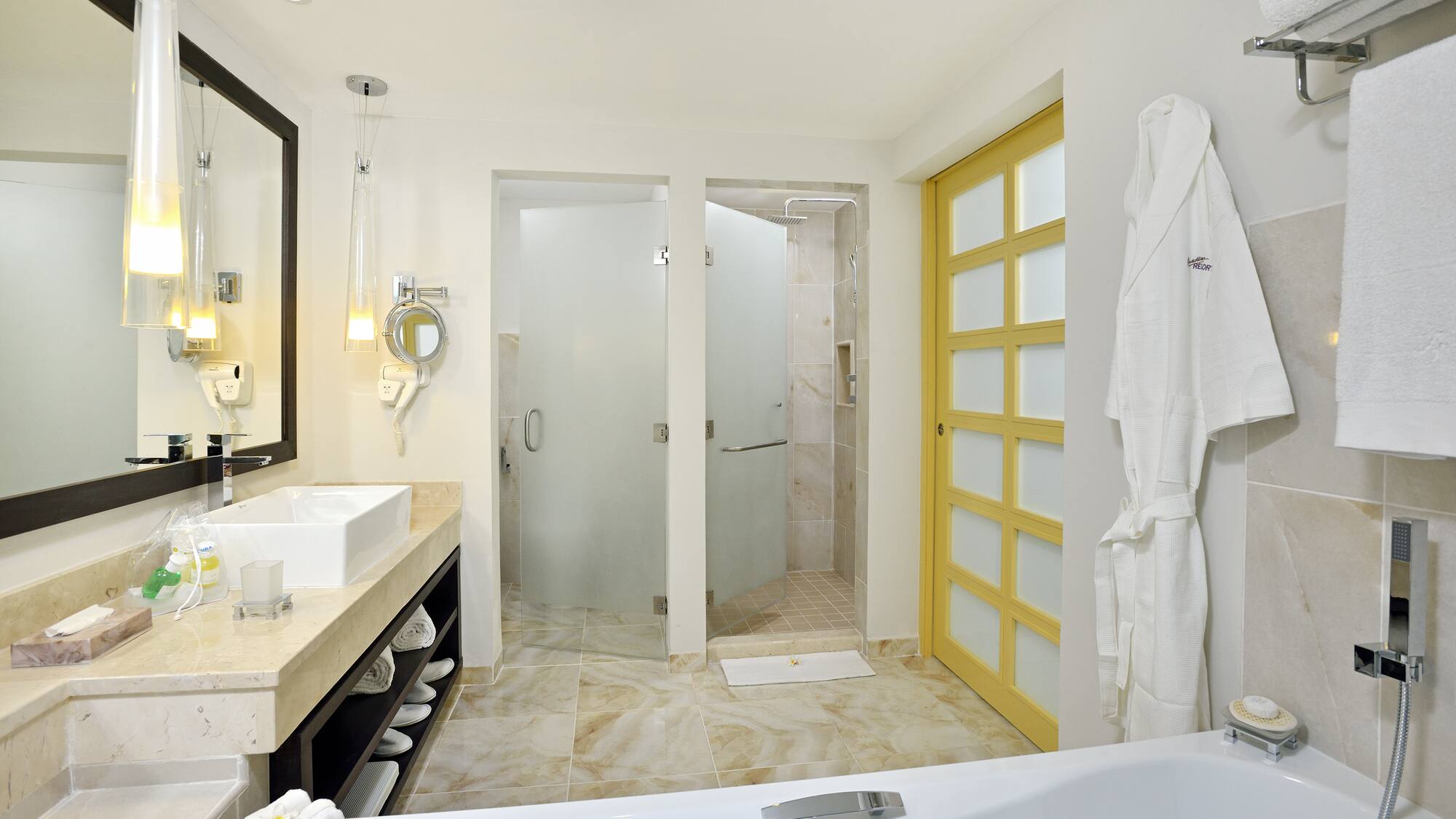 a bathroom with a bathtub and shower
