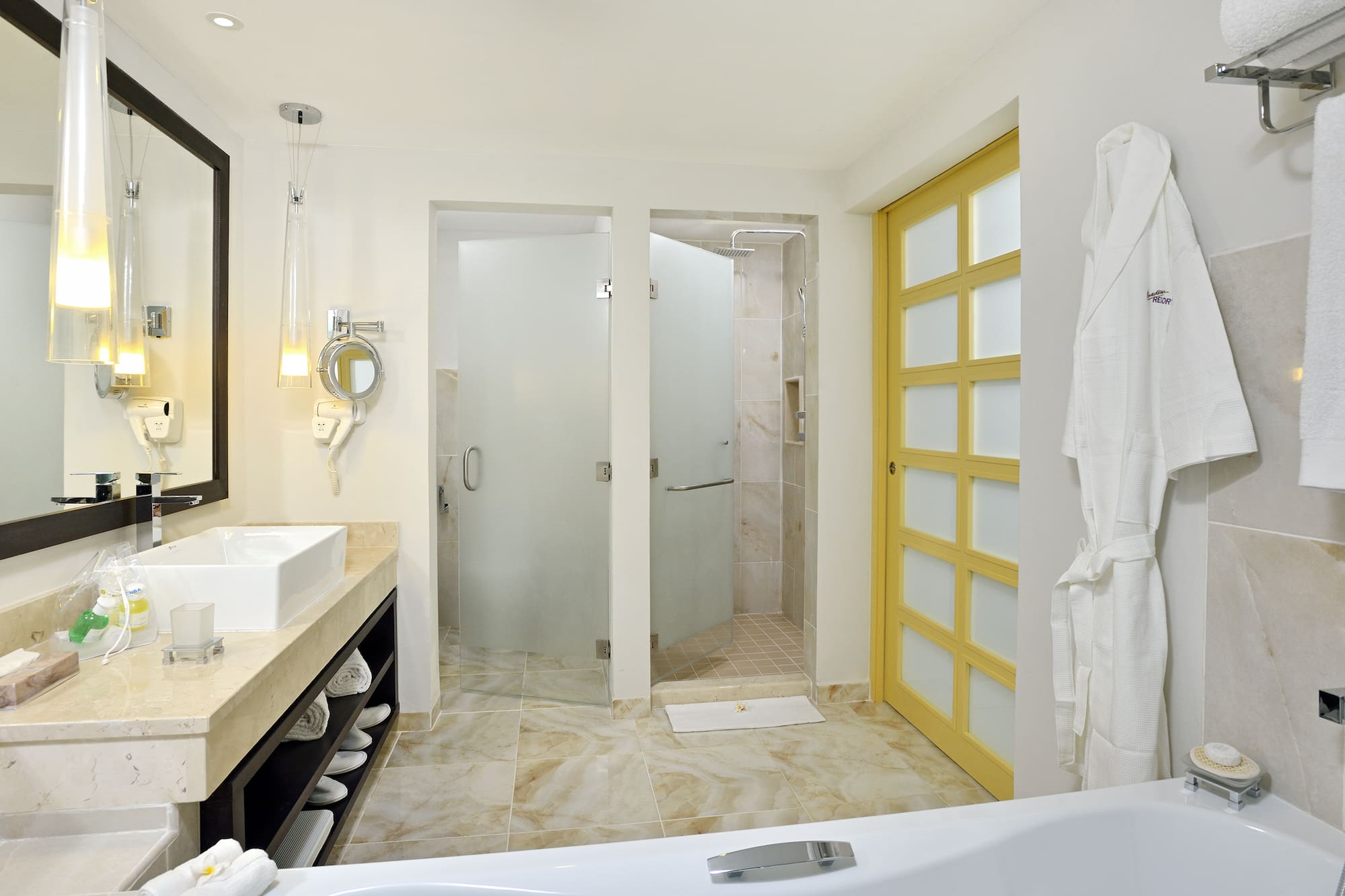 a bathroom with a bathtub and shower