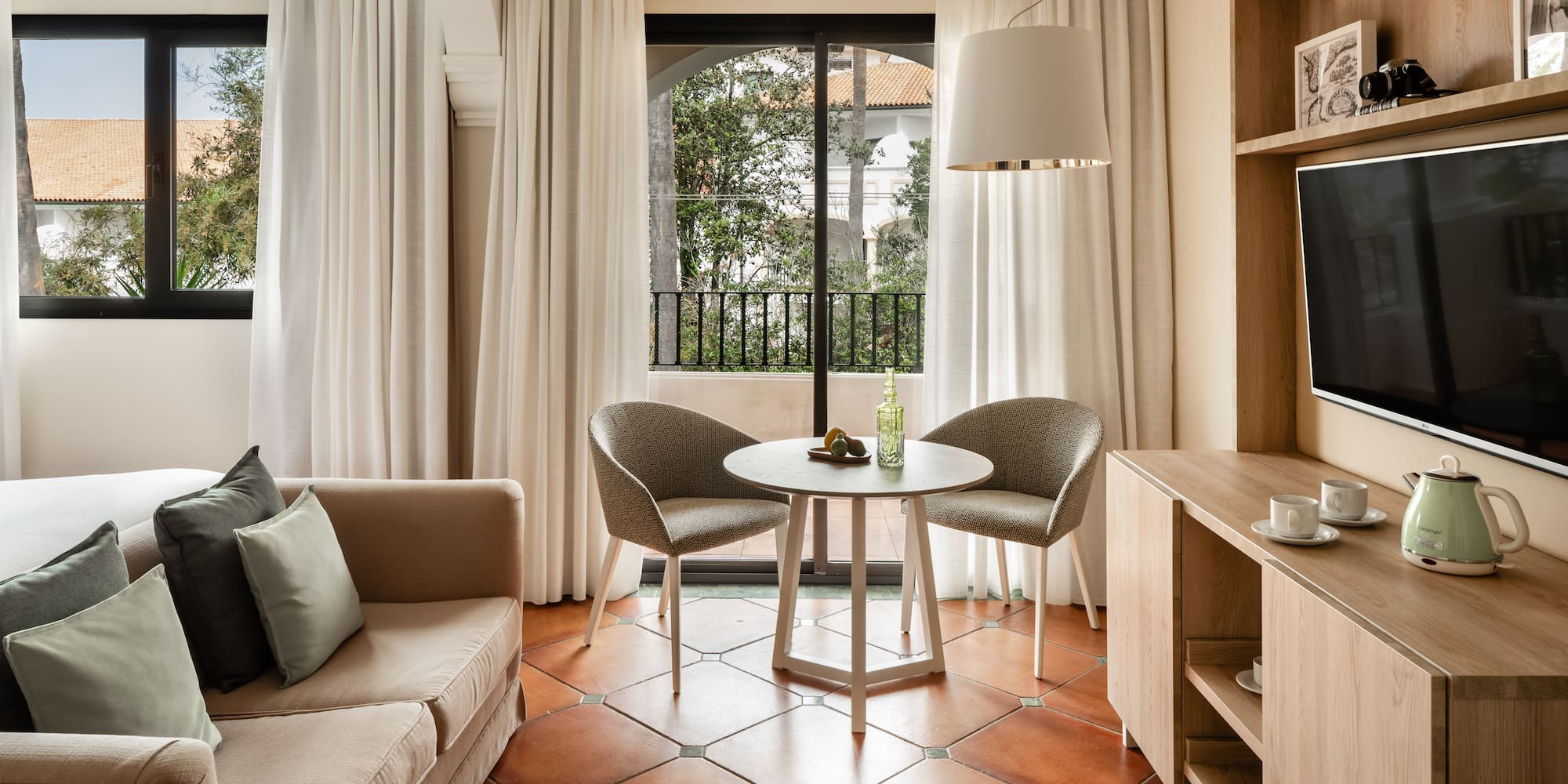 a living room with a couch and a table