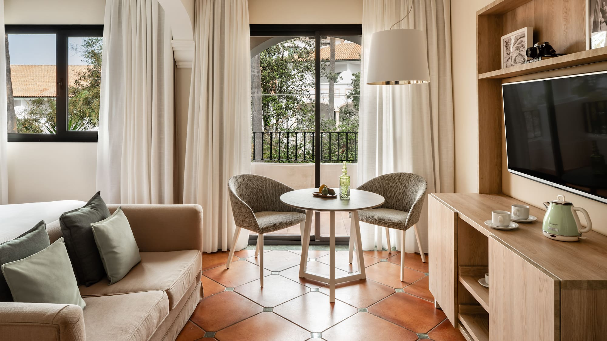 a living room with a couch and a table