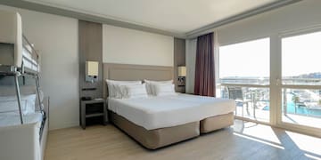 a room with a bed and a window