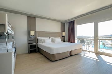 a room with a bed and a window