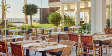 a restaurant with tables and chairs