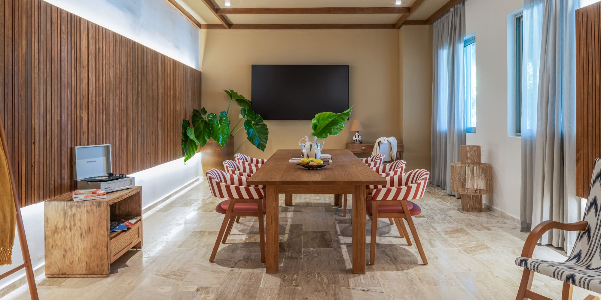 a room with a table and chairs