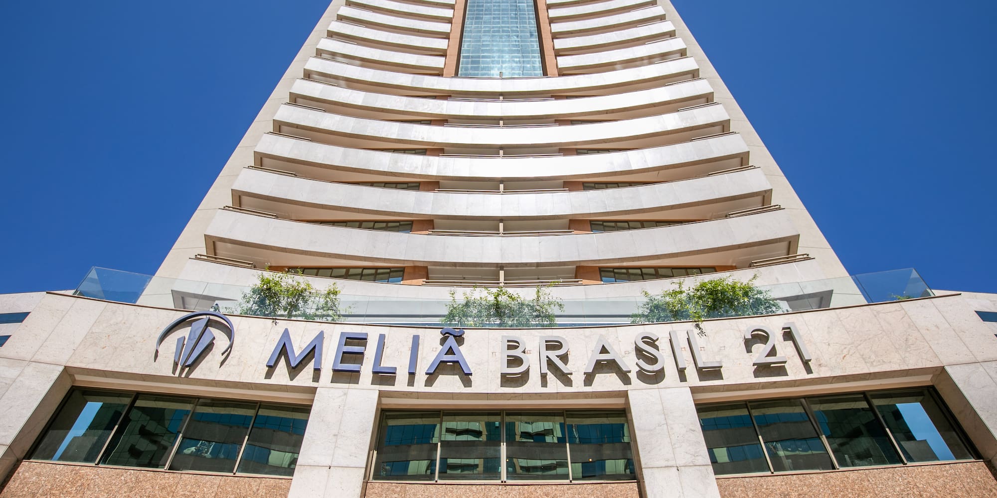 a tall building with a blue sky
