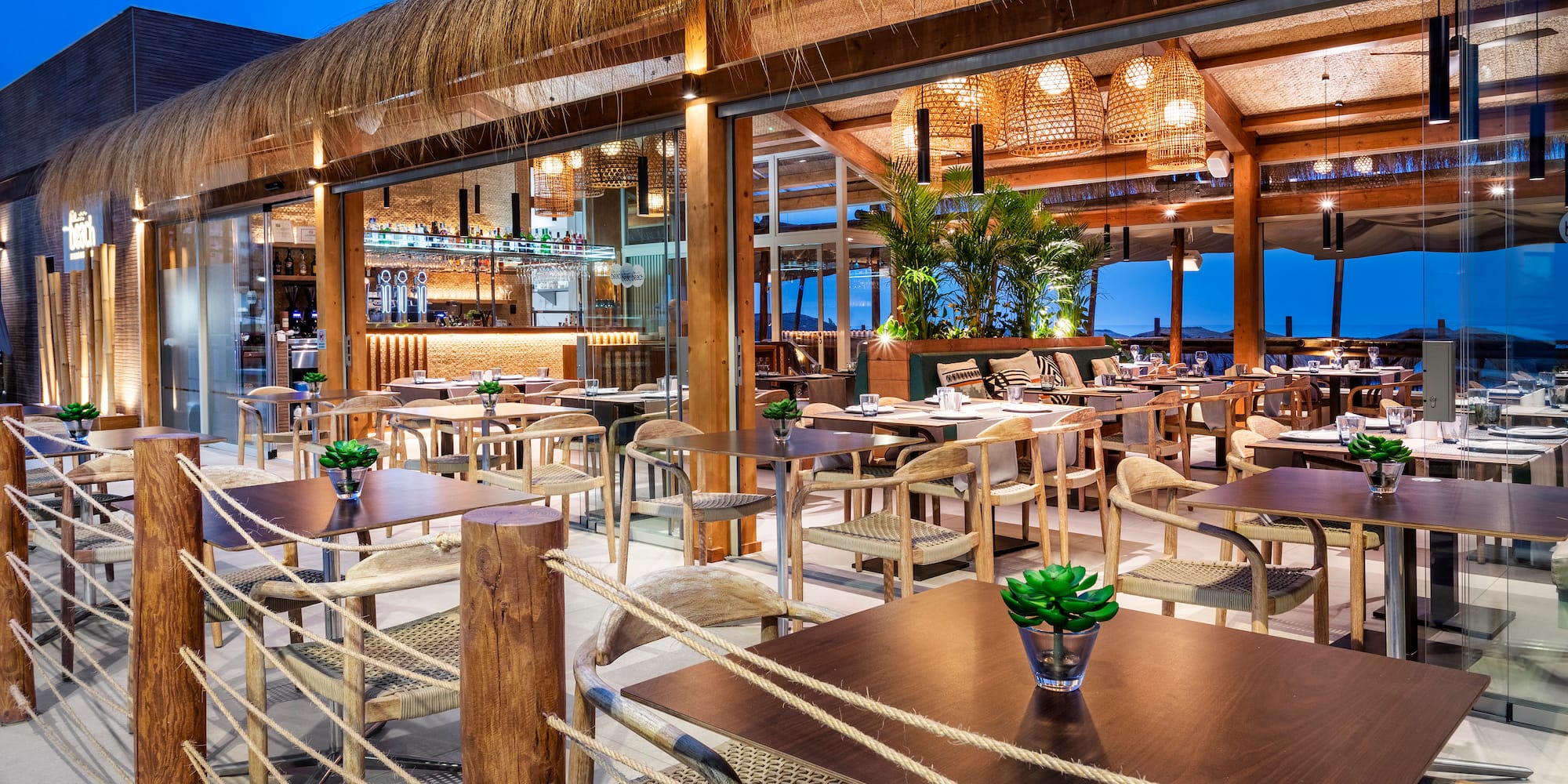 a restaurant with tables and chairs