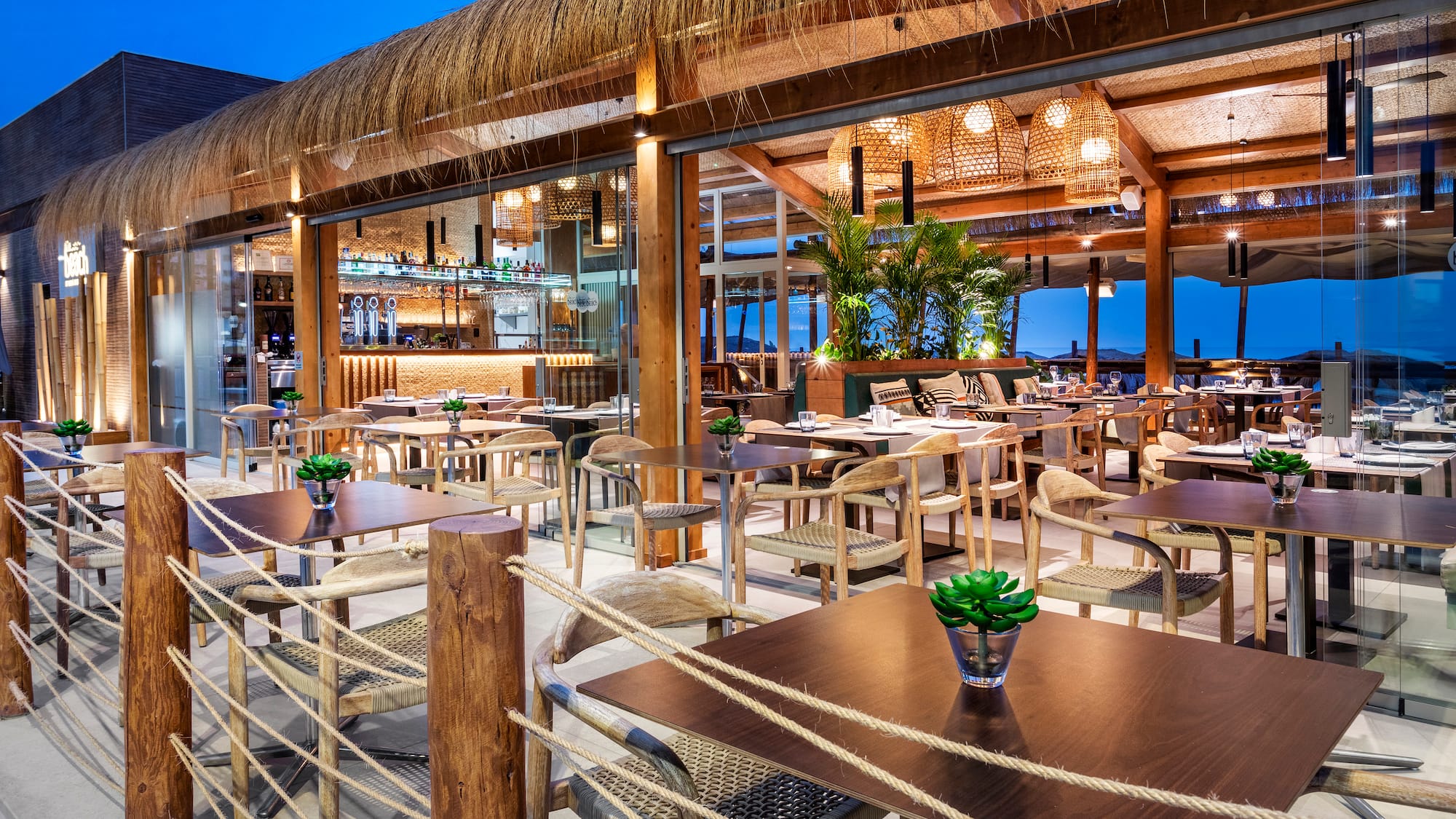 a restaurant with tables and chairs