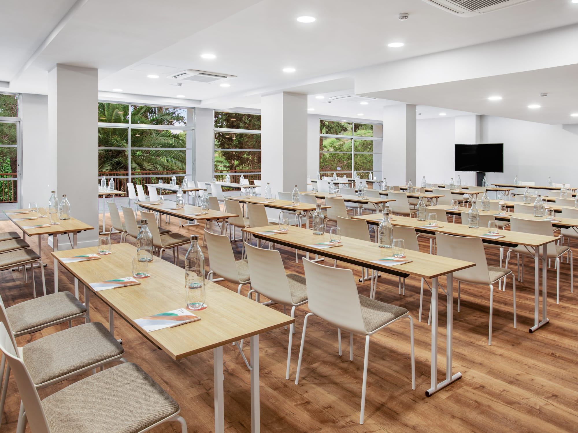 a room with tables and chairs