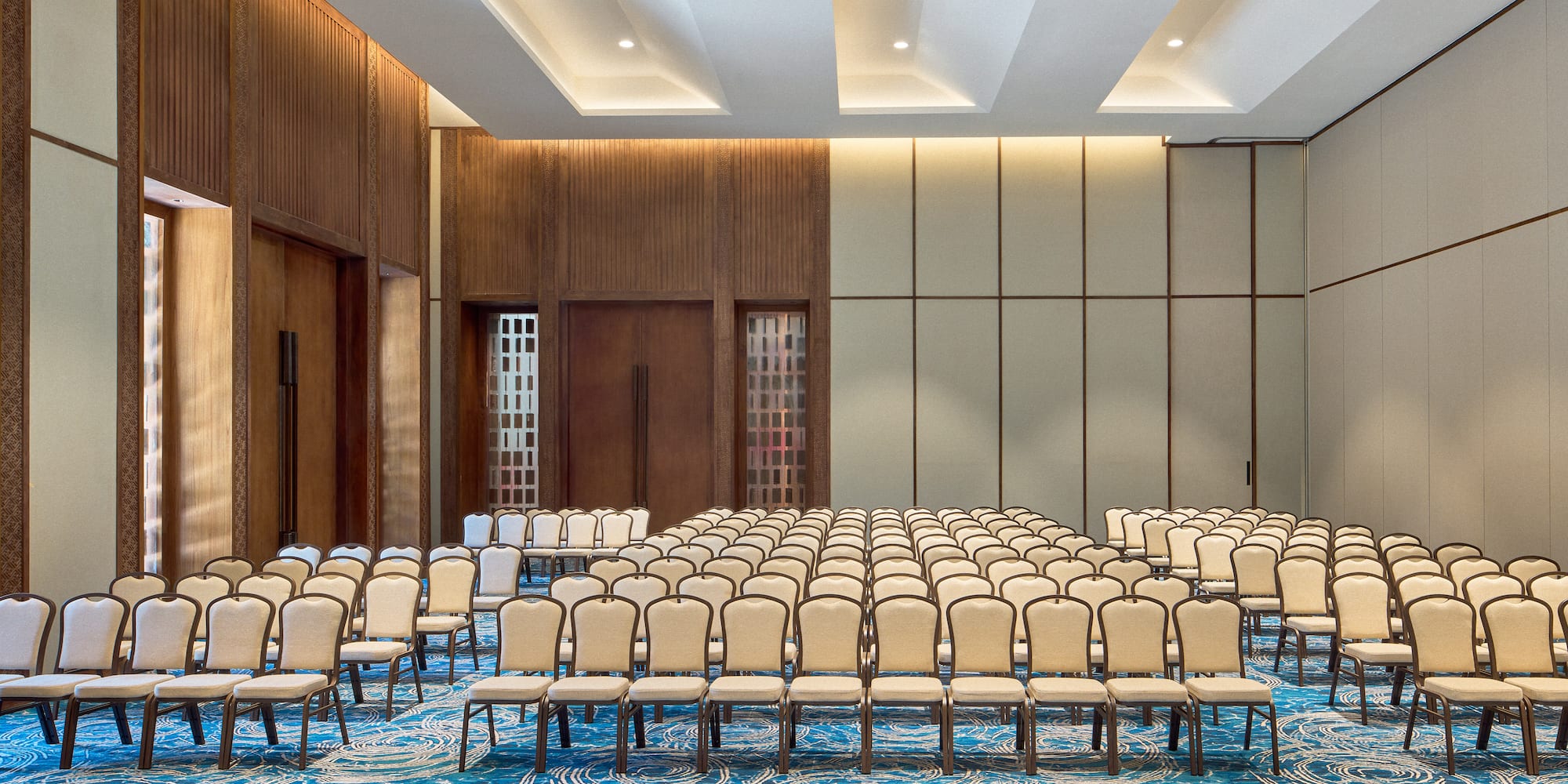 a room with rows of chairs