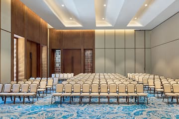 a room with rows of chairs