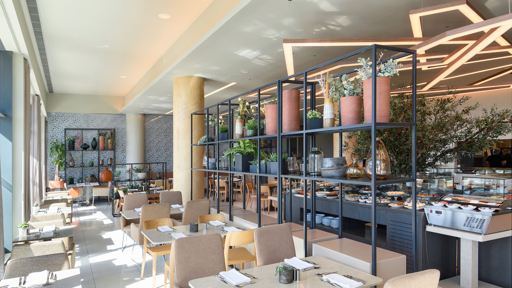 a restaurant with tables and chairs