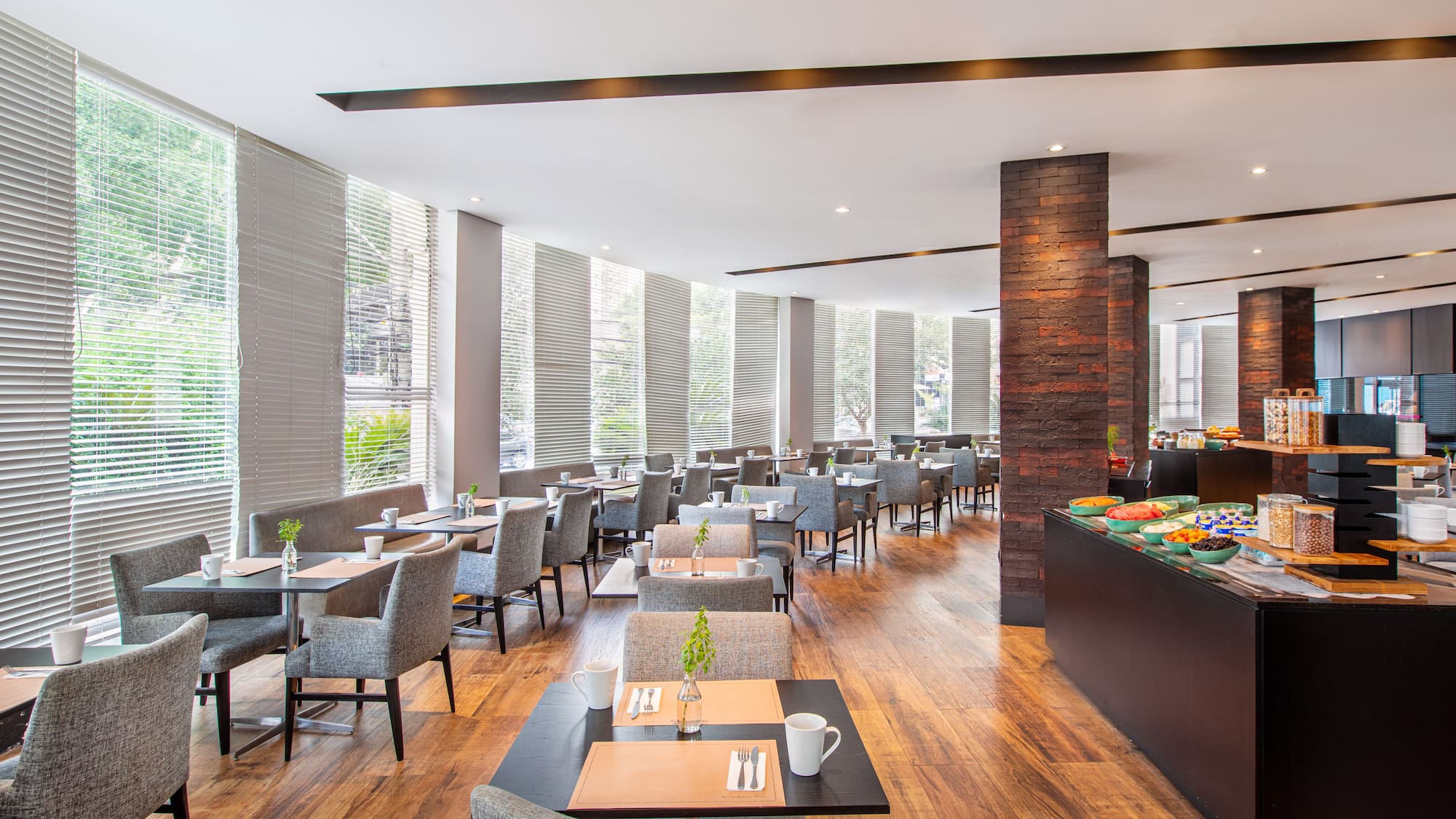 a restaurant with tables and chairs