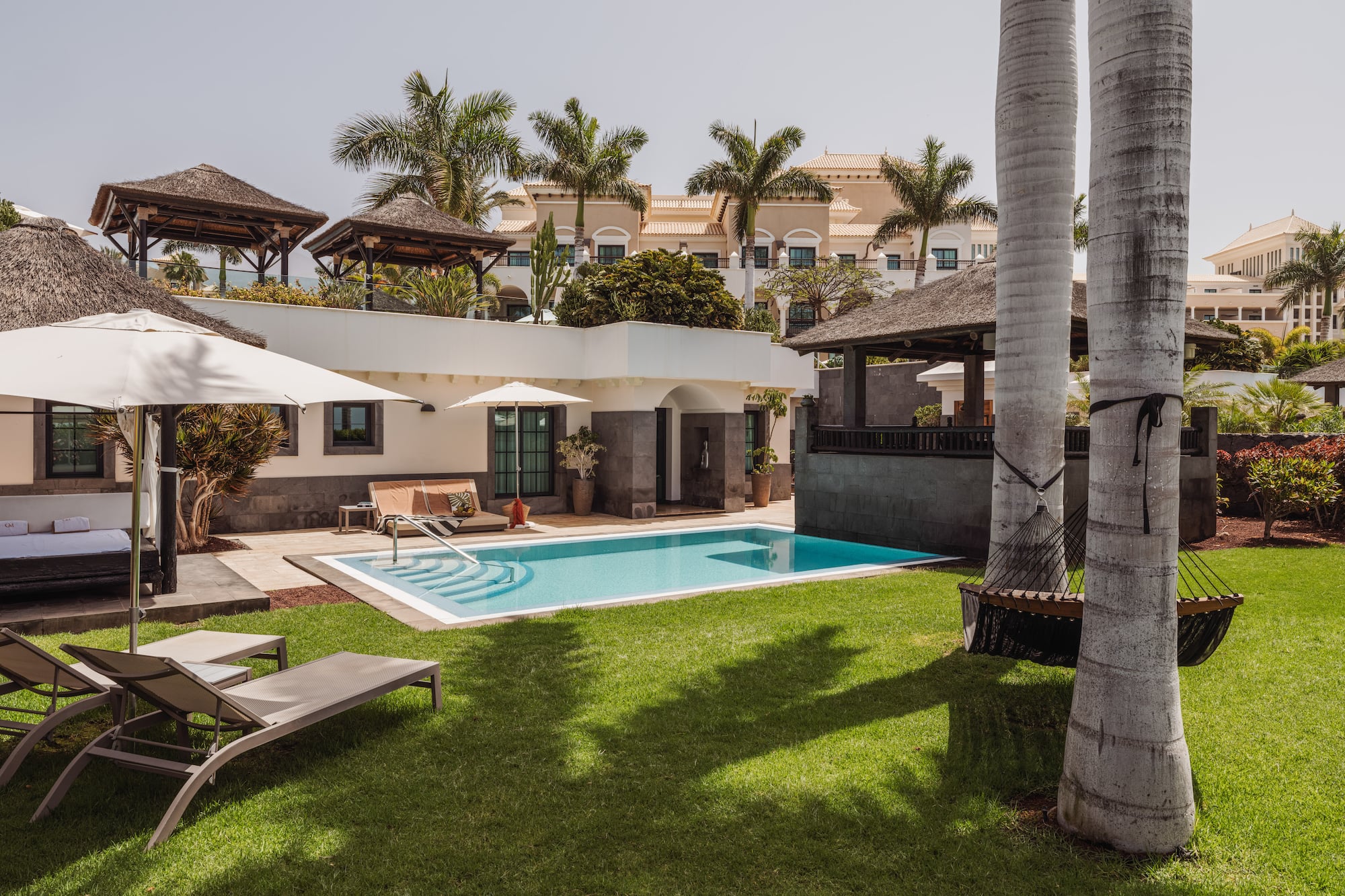 a pool in a backyard