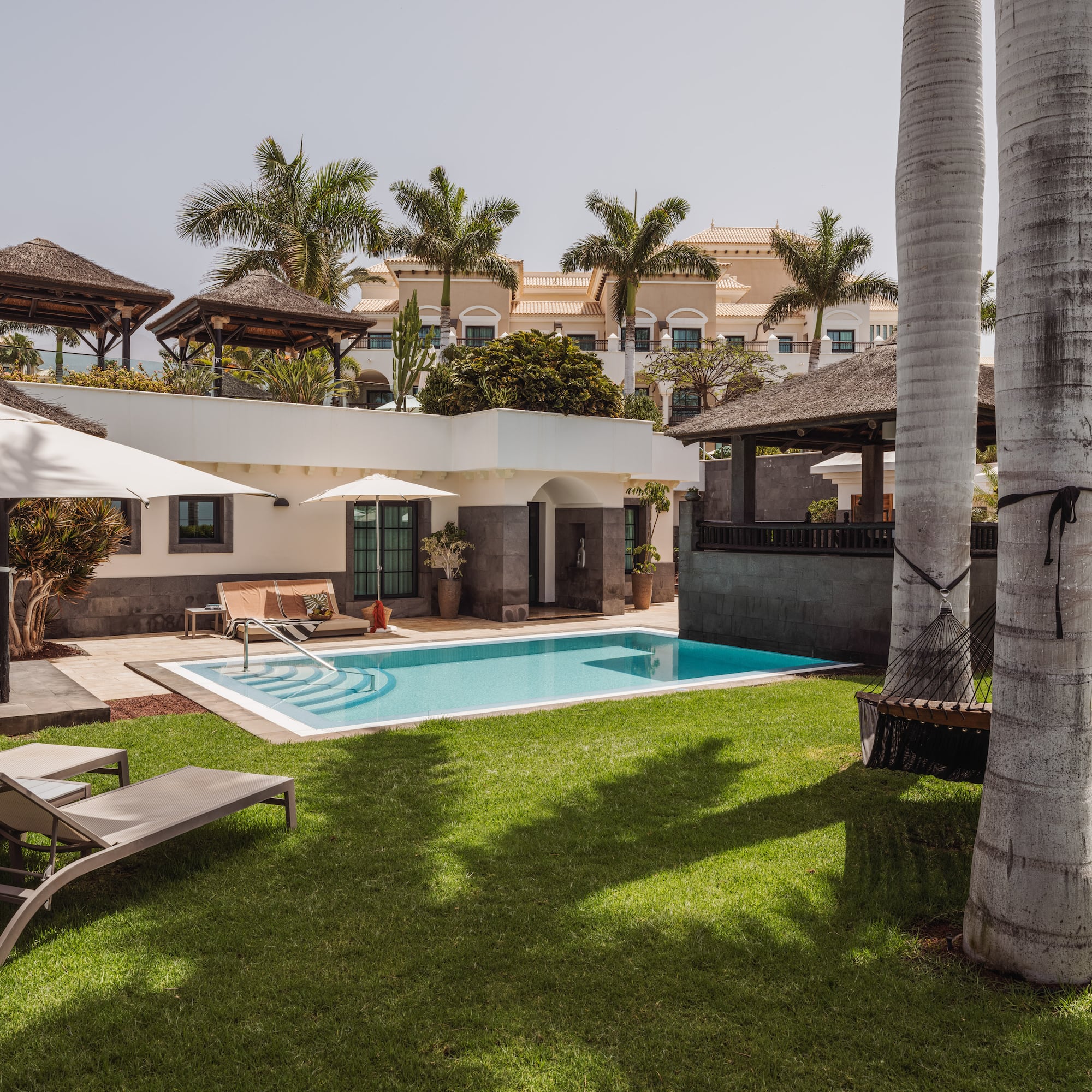 a pool in a backyard