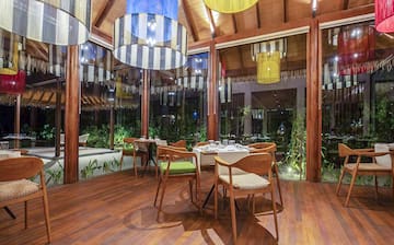 a room with a table and chairs