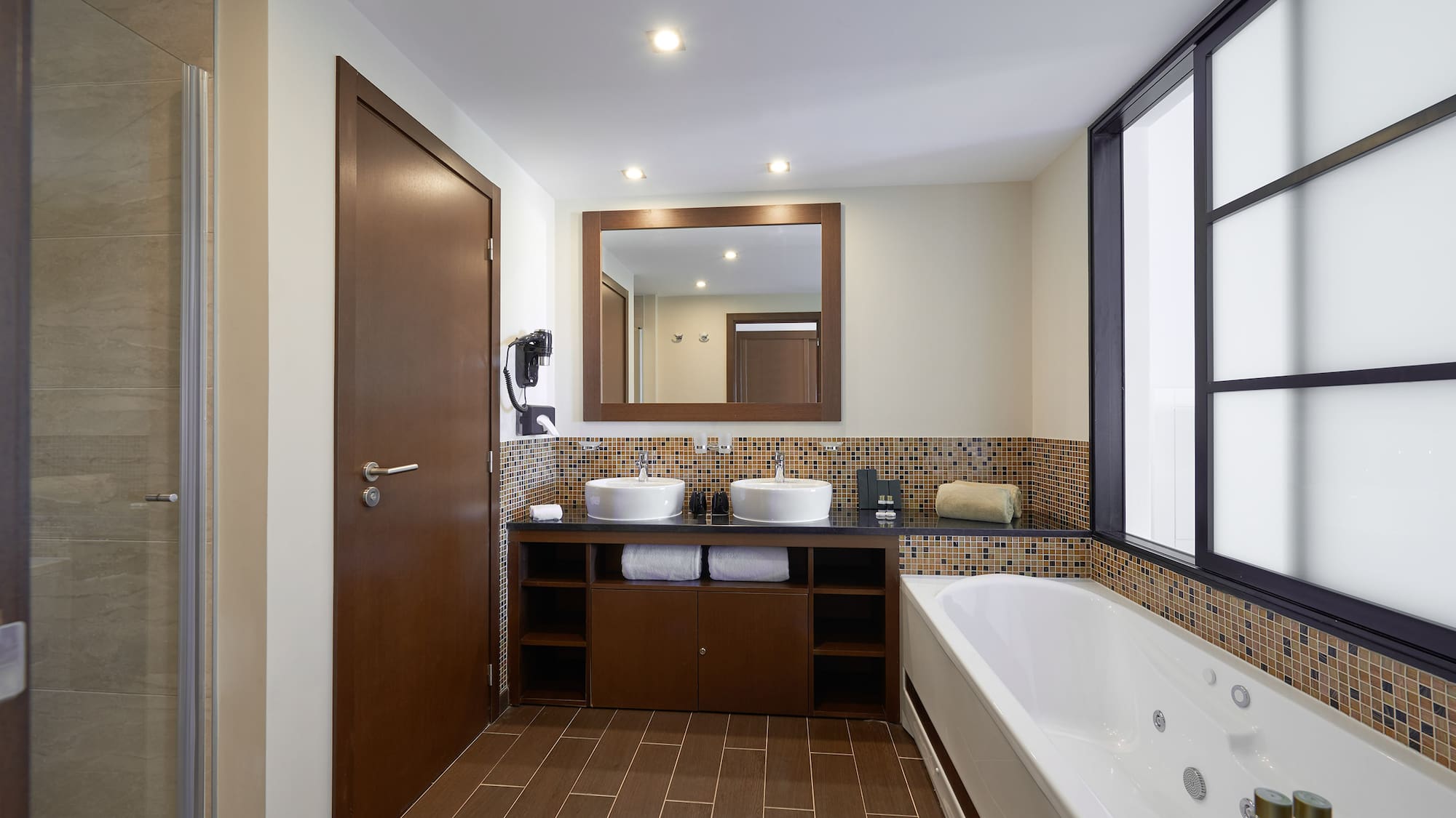 a bathroom with a bathtub and sink