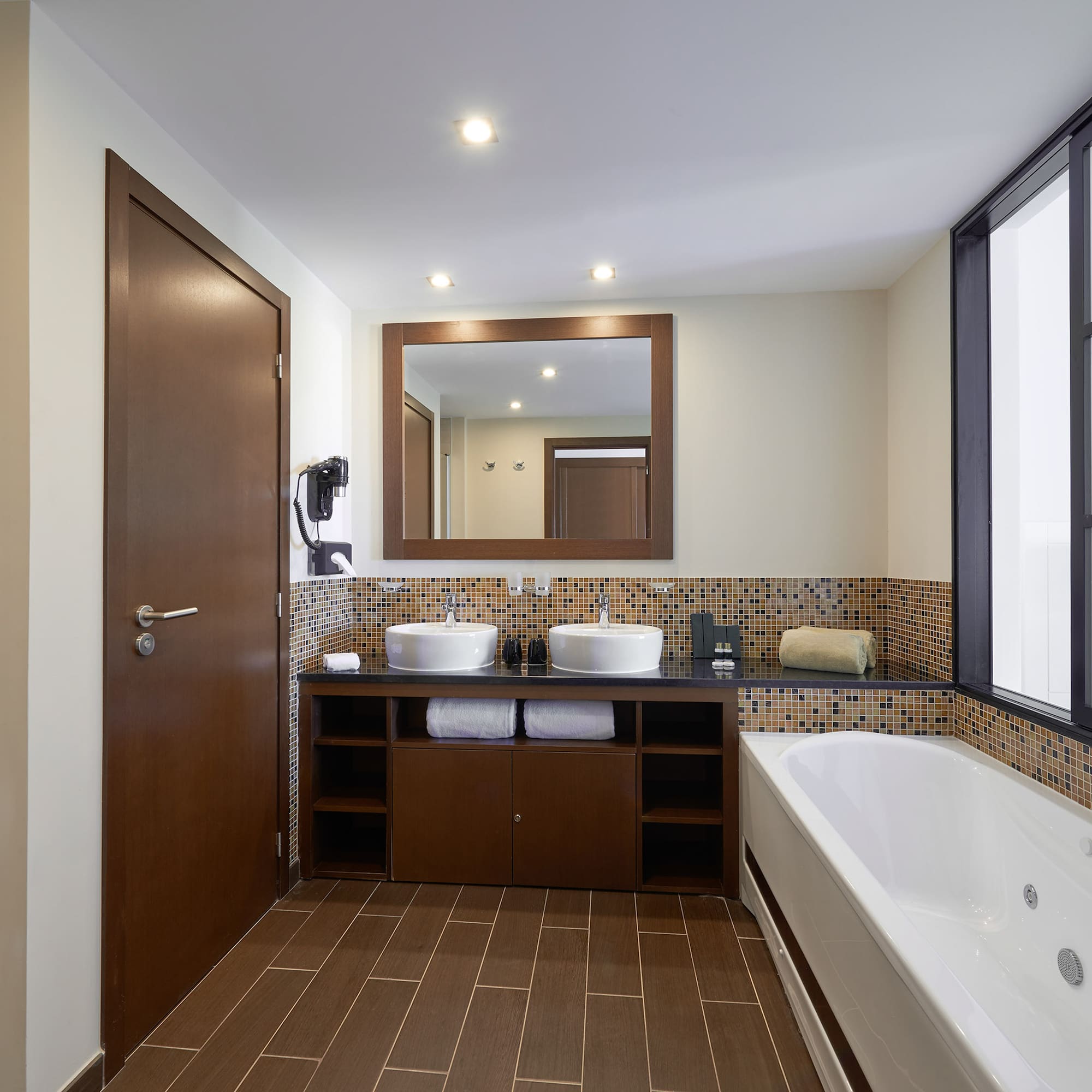 a bathroom with a bathtub and sink