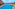 Resort swimming pool with ocean view, palm trees, and hotel.