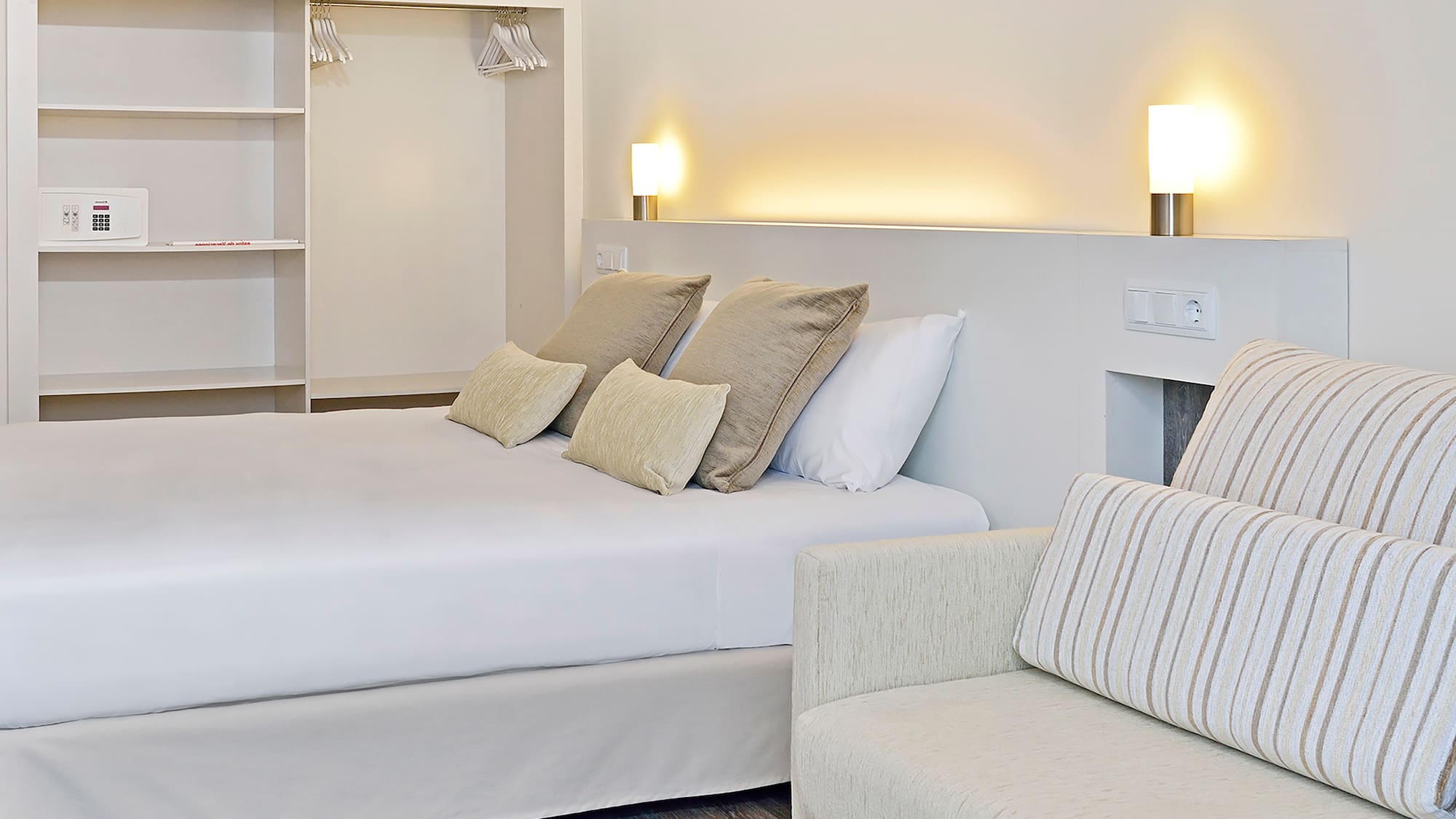a bed and couch in a room