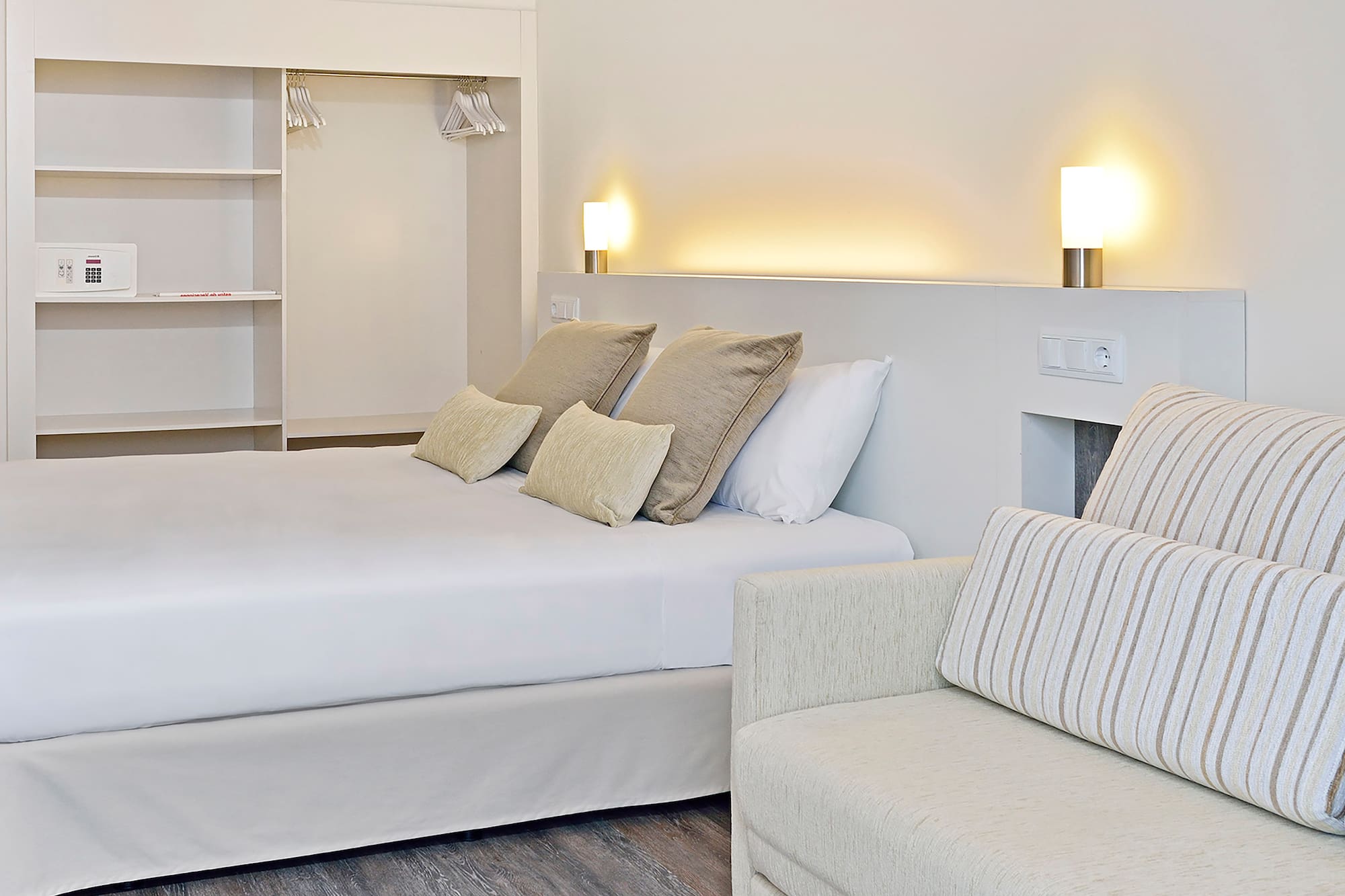 a bed and couch in a room