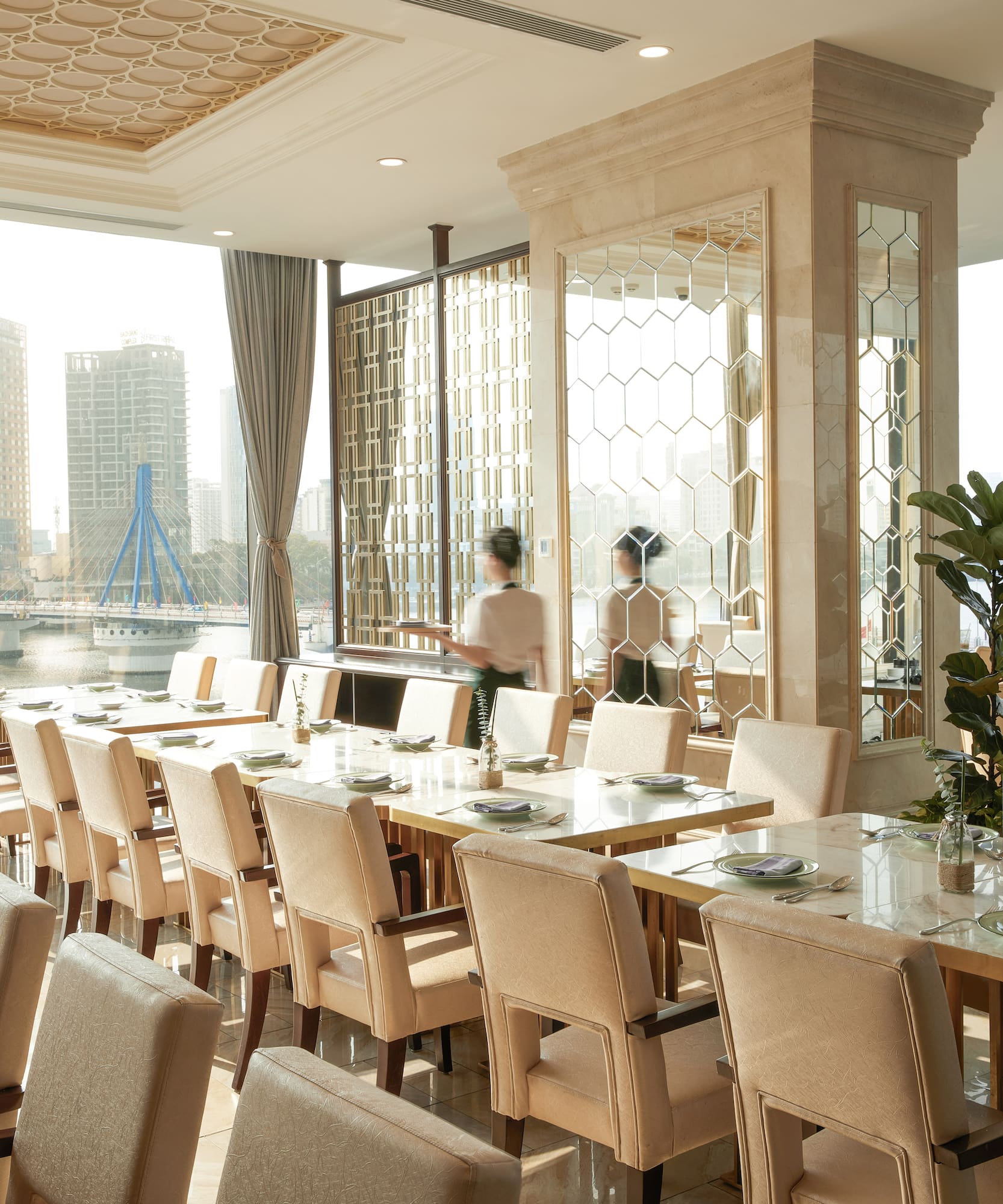 a room with a large table and chairs