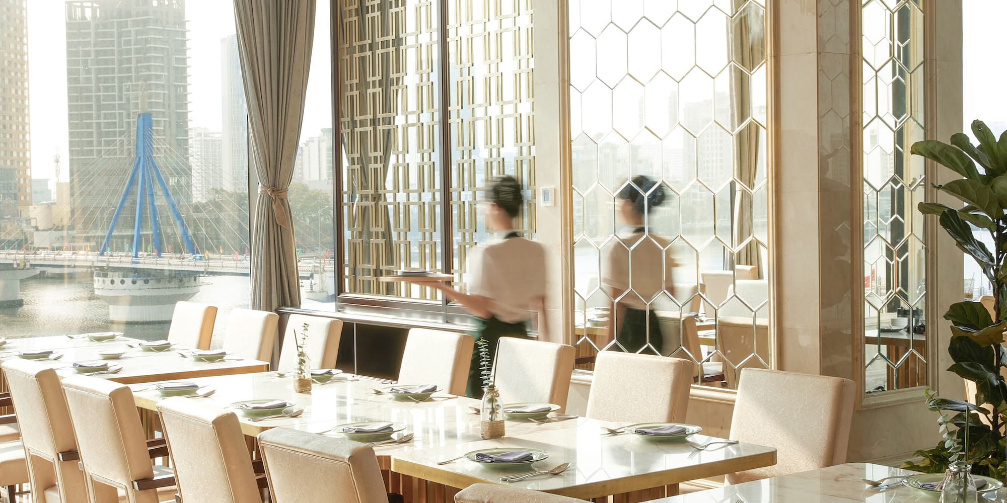 a room with a large table and chairs