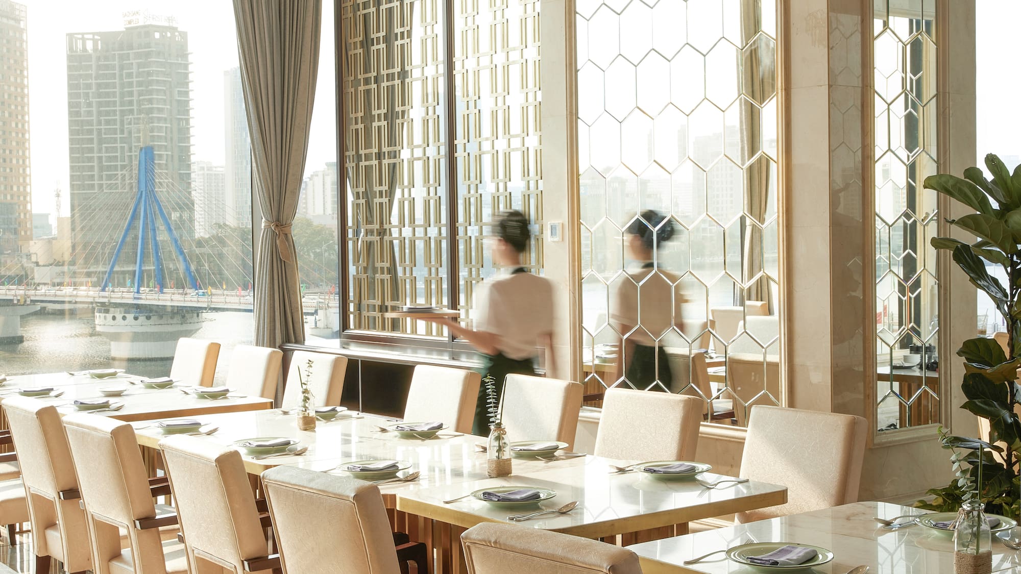 a room with a large table and chairs