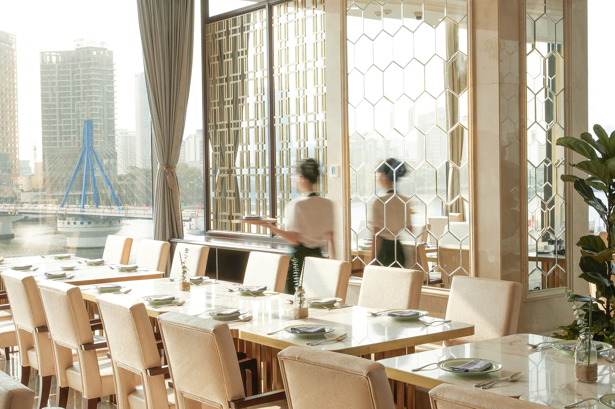 a room with a large table and chairs