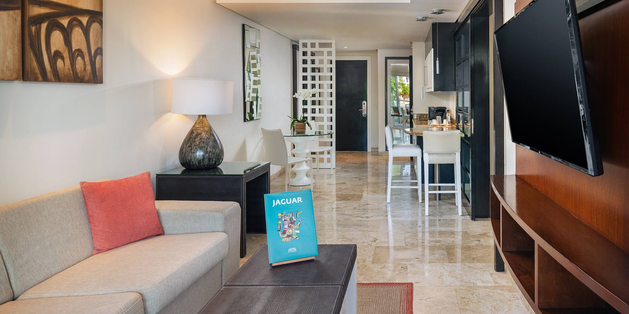 a living room with a tv and a couch