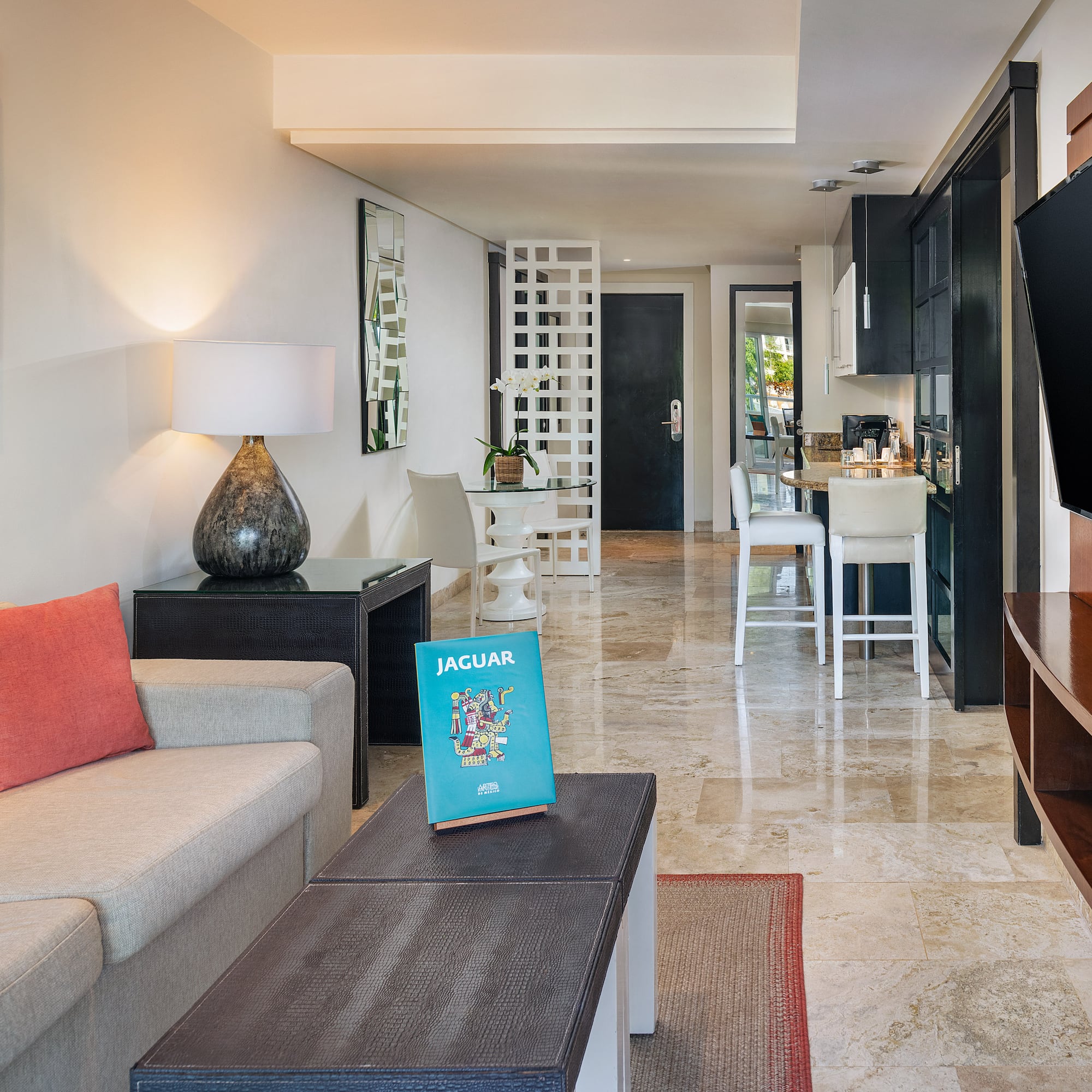 a living room with a tv and a couch