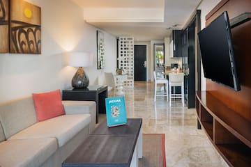 a living room with a tv and a couch